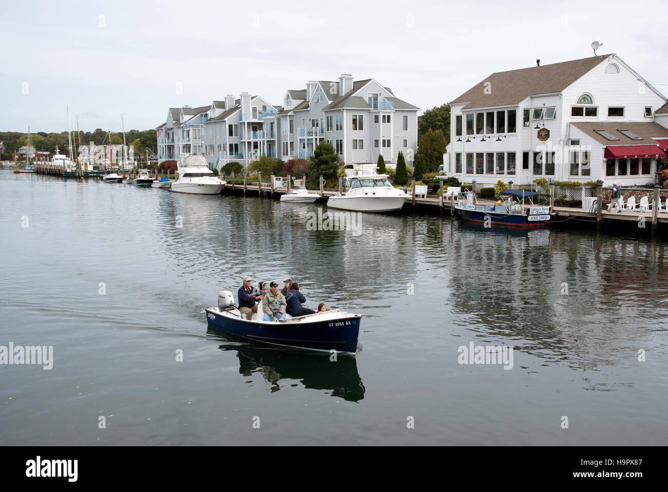 Mystic River Connecticut USA A small pleasure craft and passengers