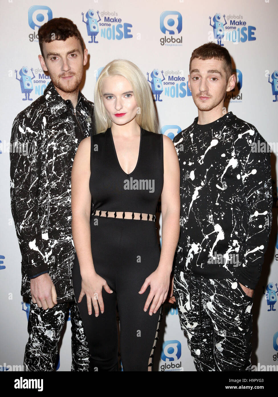 (left-right) Jack Patterson, Grace Chatto and Luke Patterson of Clean Bandit during Global's Make Some Noise Night, held at Supernova, at Victoria Embankment Gardens, London. The star-studded event raised money for Global's Make Some Noise - the charity set up by Global, the media and entertainment group - to help disadvantaged youngsters across the UK. Stock Photo