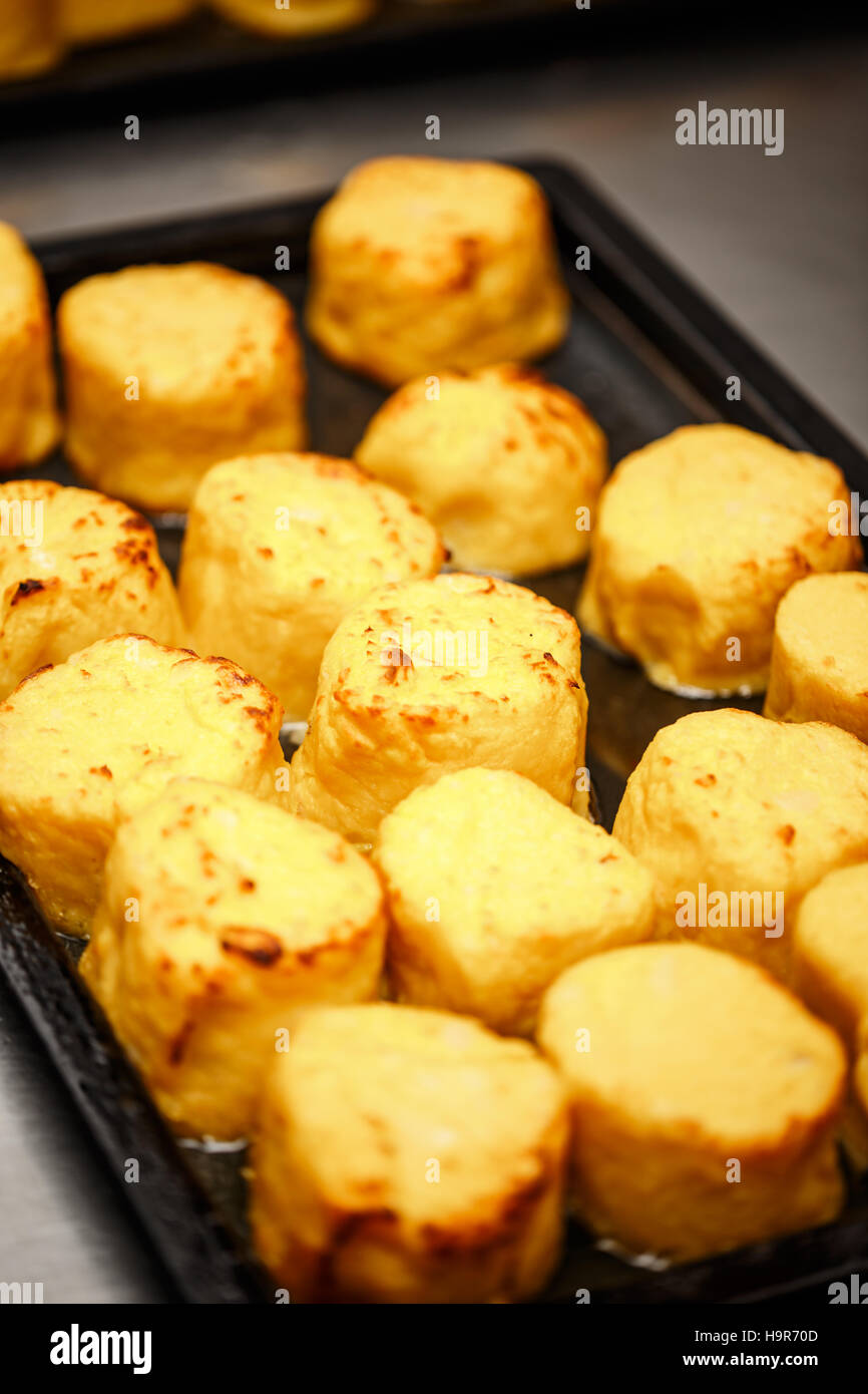 Mashed potato fried in forms, restaurant kitchen Stock Photo