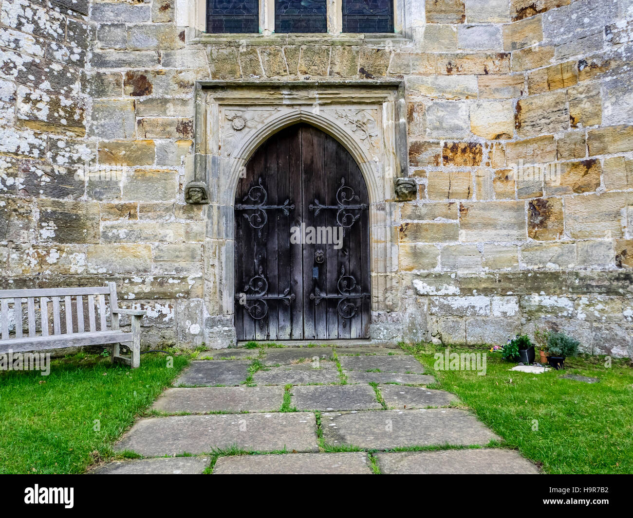 Rear Church Door of the 12th Century Little Horsted Church East Sussex restored in 1863. Stock Photo