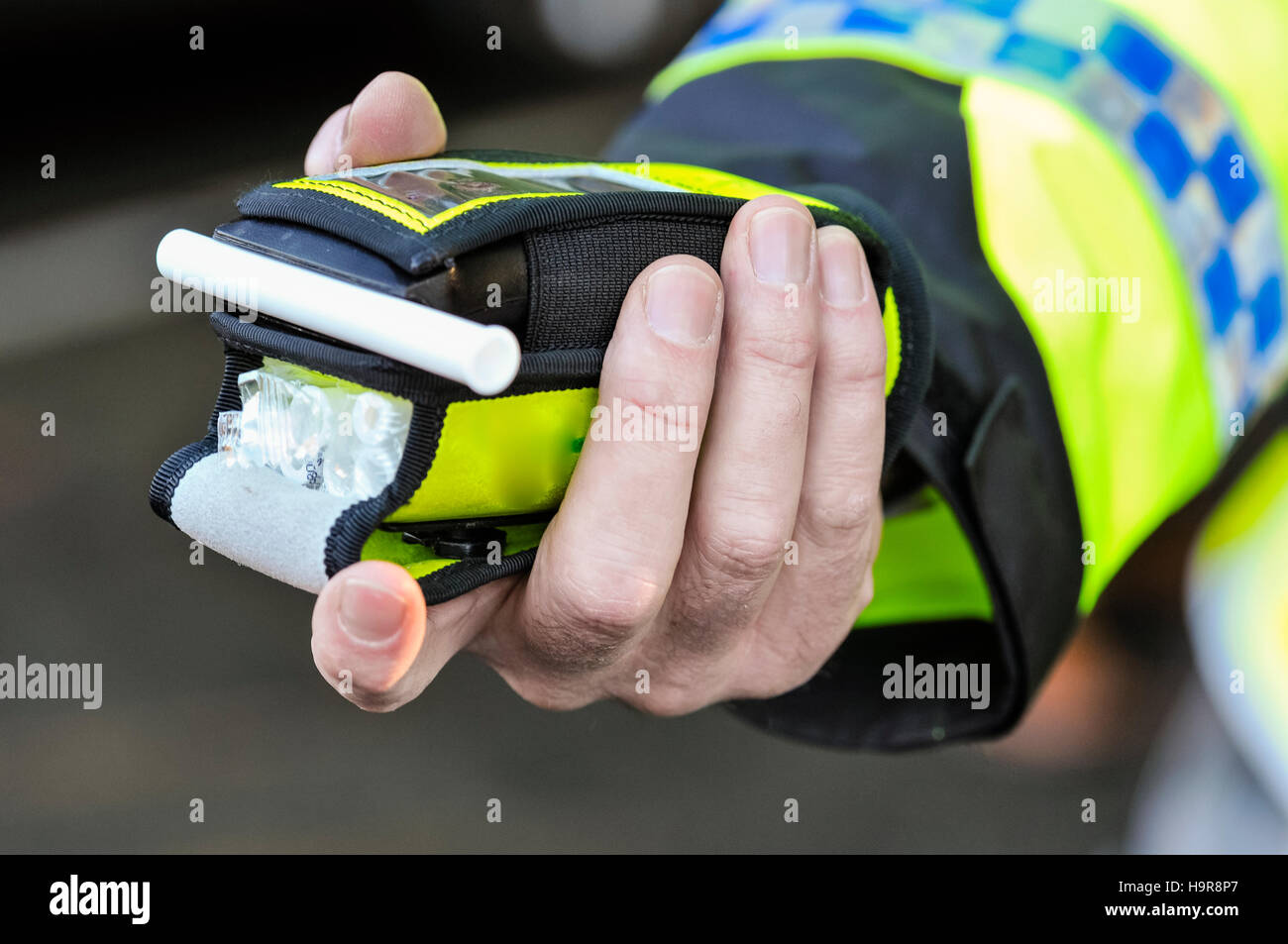 Belfast, Northern Ireland. 24 Nov 2016 A police officer holds a