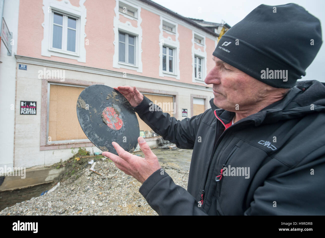 Simbach Germany 2nd Nov 16 Georg Mitterer Holds On To A Vinyl While Standing In Front Of His Former Music Store In Simbach Germany 2 November 16 A Flood Of Water Dirt