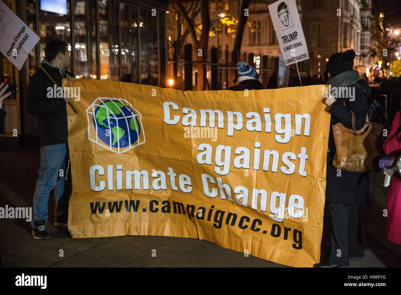 London, UK. 25th November, 2016. Activists from the Campaign Against Climate Change protest outside the US Embassy in solidarity with American climate activists preparing to campaign against President Elect Donald Trump and also in solidarity with those protesting at Standing Rock. Credit:  Mark Kerrison/Alamy Live News Stock Photo