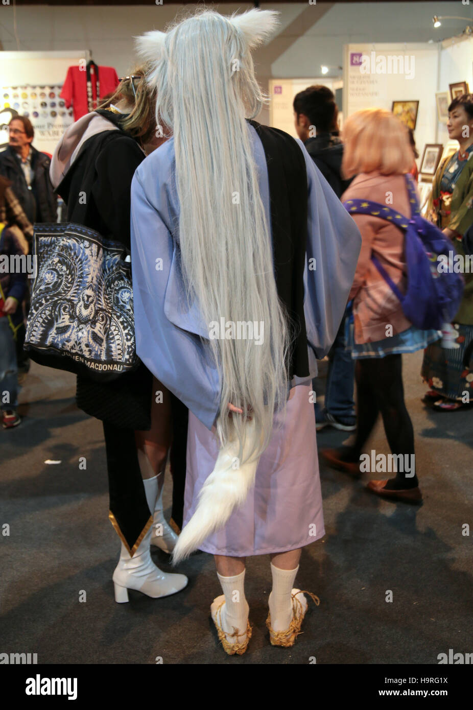 London UK 25 Nov 2016 Tobacco Docks open its doors to celebrate the culture of Japan , cosplay , manga comics, food ,Saki, sushi ,Wagashi ,traditional Japanese sweets,Japanese tea kettles ,mask Furyu Dance mask,Japanese handcrafted items,music and traditional Japanese culture @Paul Quezada-Neiman/Alamy Live News Stock Photo