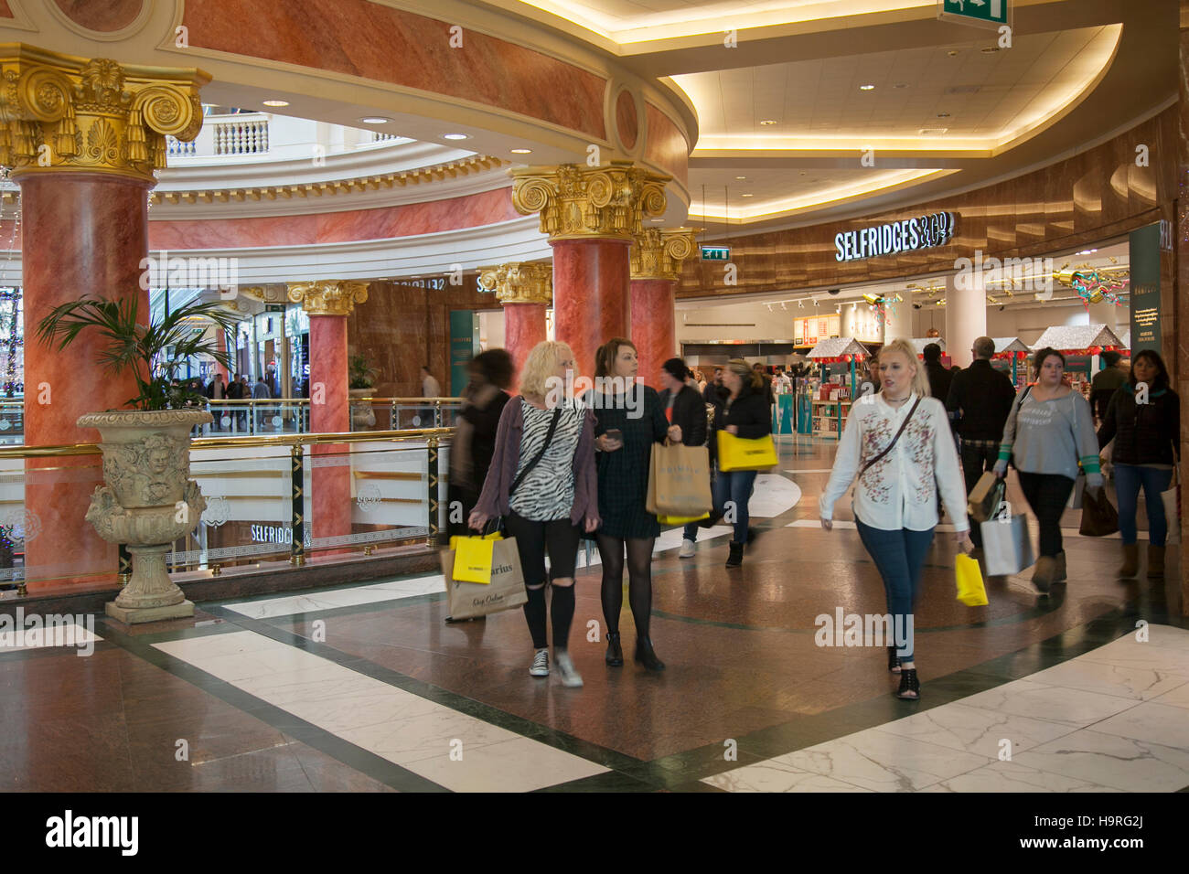 Selfridges at INTU Trafford Centre  Manchester. UK  25th November, 2016. Black Friday Sales Weekend.  City centre mall holiday shopping season, retail shops, shop interior stores, Christmas shoppers, people discount sale shopping, and consumer spending on Black Friday weekend considered to be the biggest shopping event of the year.   U.K. retailers have embraced the U.S. post-holiday sale bonanza, even though many customers were left surprised by wall-to-wall discounts in their favourite stores as some went bonkers for bargains. Stock Photo