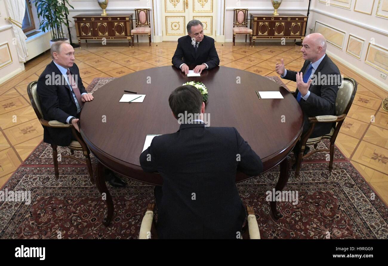Moscow, Russia. 25th Nov, 2016. Russian President Vladimir Putin, left, during a meeting with FIFA president Giovanni Infantino, at the Kremlin November 25, 2016 in Moscow, Russia. Joining the meets is Russian Minister of Sport Vitaly Mutko. Credit:  Planetpix/Alamy Live News Stock Photo
