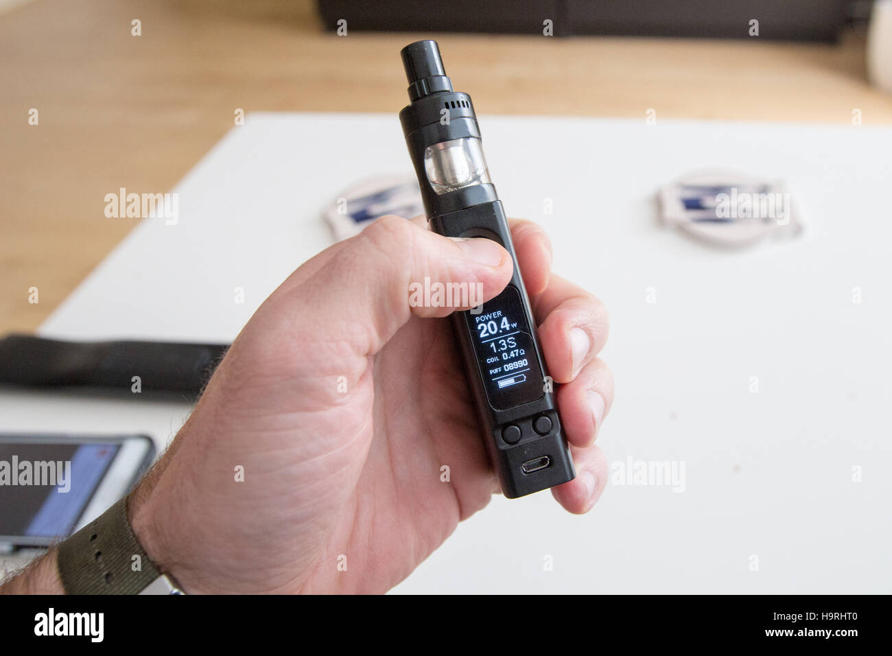 Gdansk, Poland 26 November 2016 Man smoking e-cigarette is seen in his flat  in Gdansk on 26th of November 2016. Electronic cigarettes greatly help to  quit smoking and reduce the traditional -