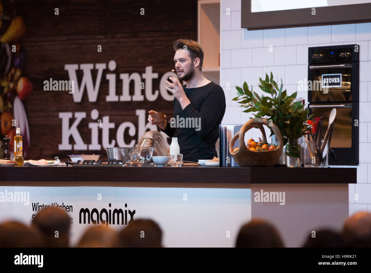 John Whaite from ITV's Lorraine doing a cooking demo on the Winter Kitchen stand Stock Photo