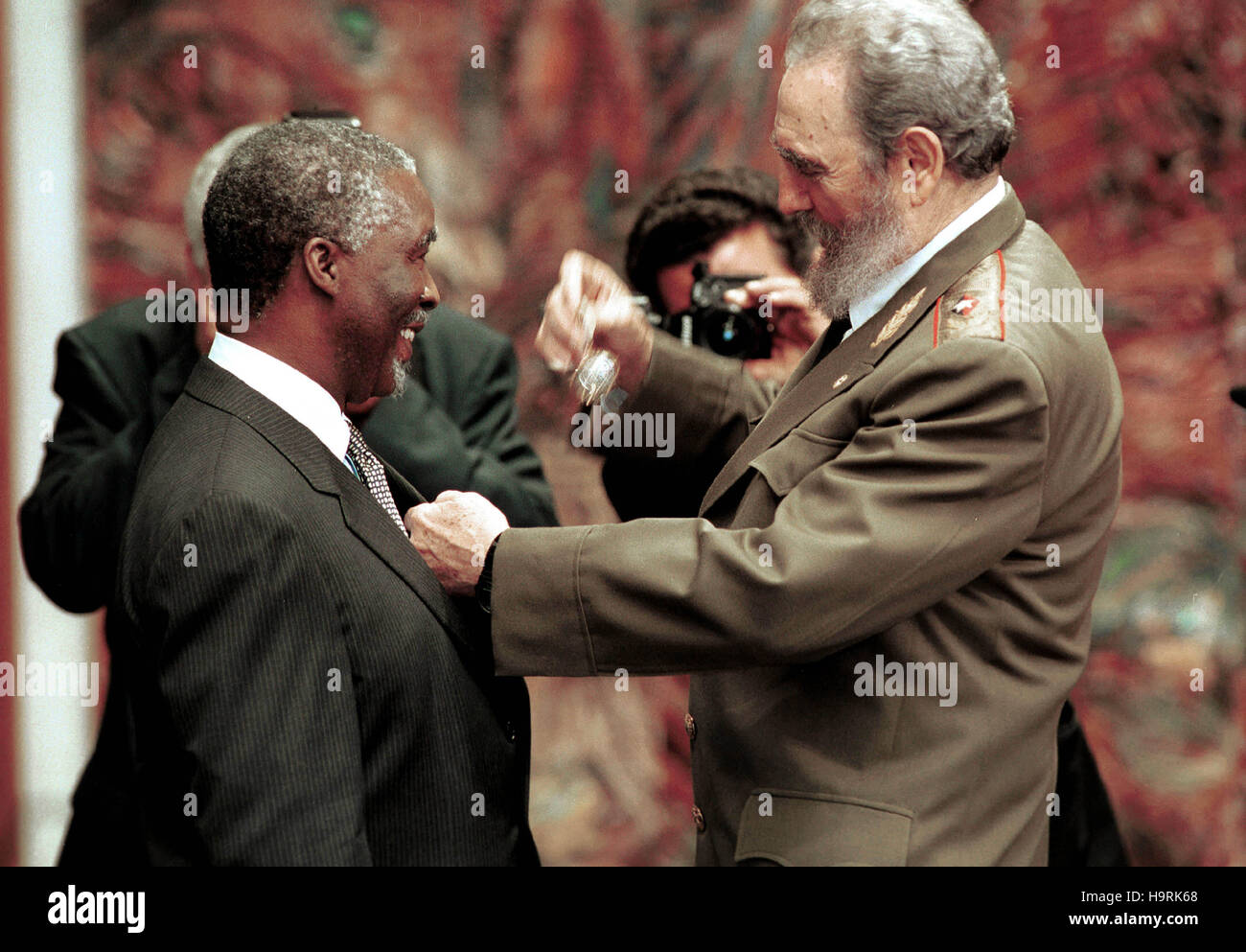 Cuban President Fidel Castro, right, presents South African President Thabo Mbeki with the Order of Jose Marti medal, Cuba´s highest honor, March 28, 2001 in the Palace of the Revolution in Havana, Cuba. Credit: Jorge Rey/MediaPunch Stock Photo