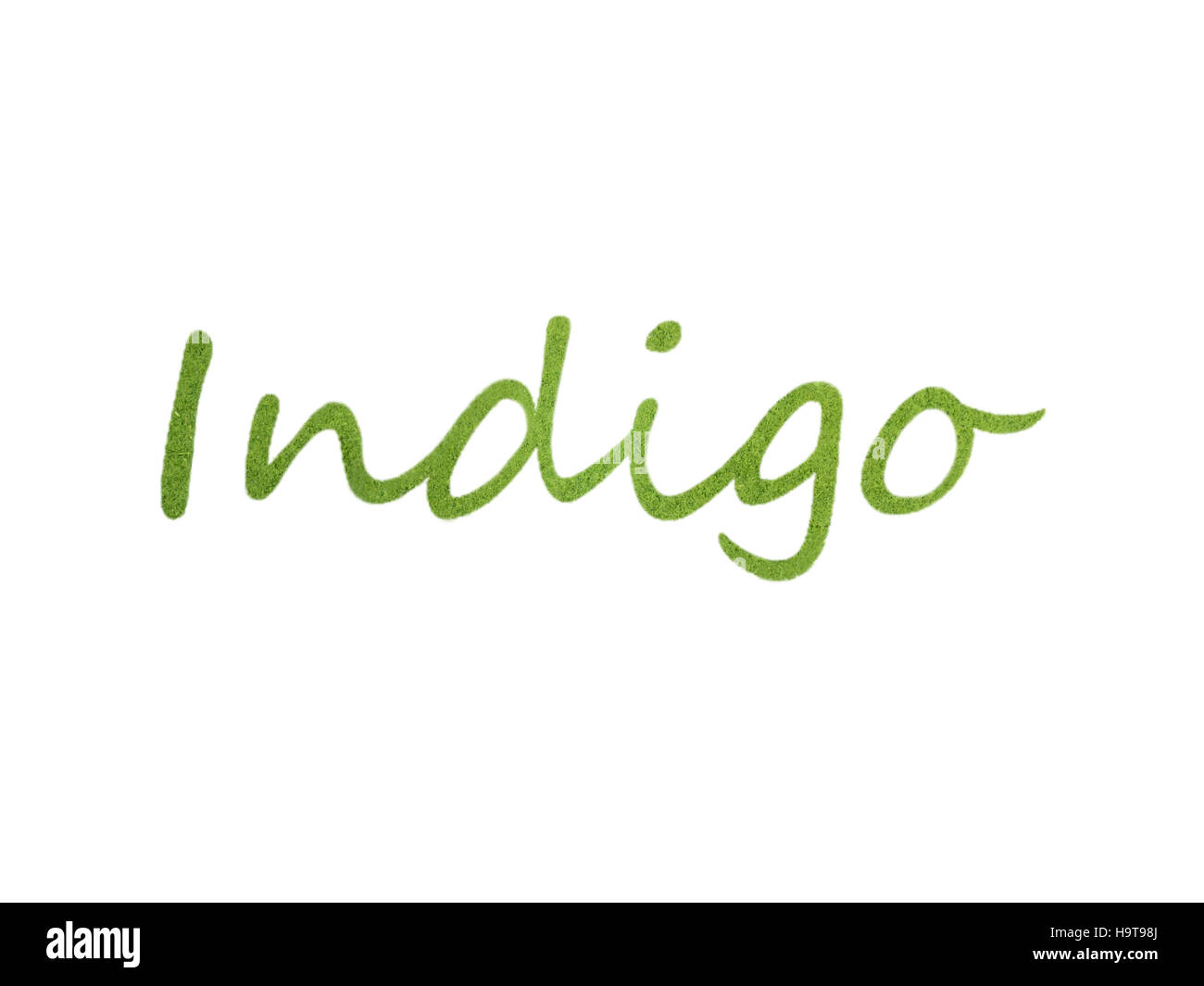 Indigo indigofera tinctoria powder lettering Stock Photo
