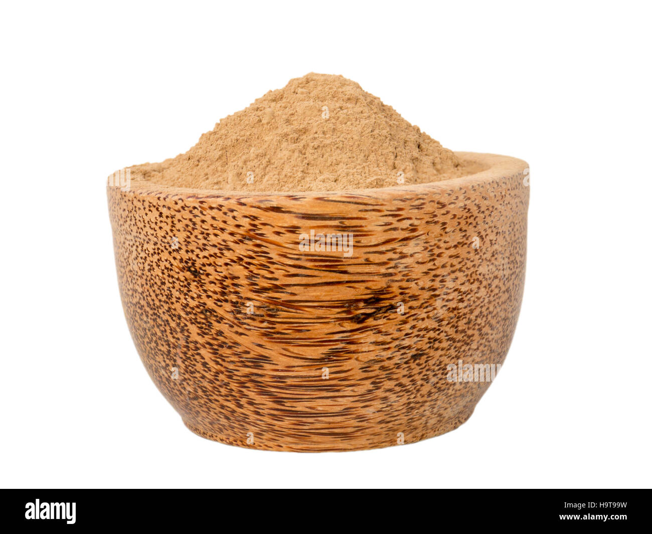 Amalaki emblica officinalis superfood powder in the wooden bowl isolated on white Stock Photo