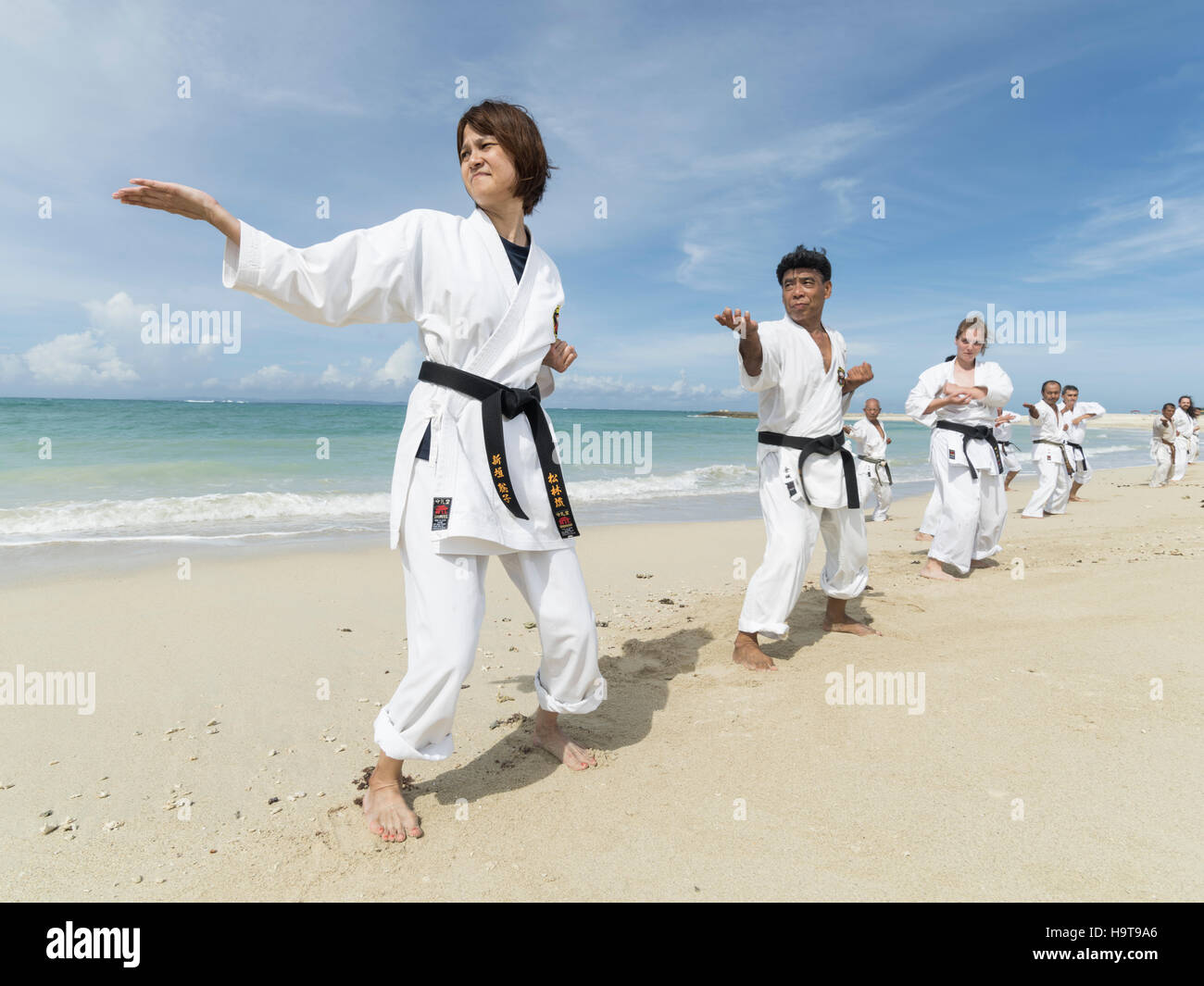 Performing karate kata in Okinawa the birthplace of karate as part of 100 Kata for Karate Day event 2016. Stock Photo