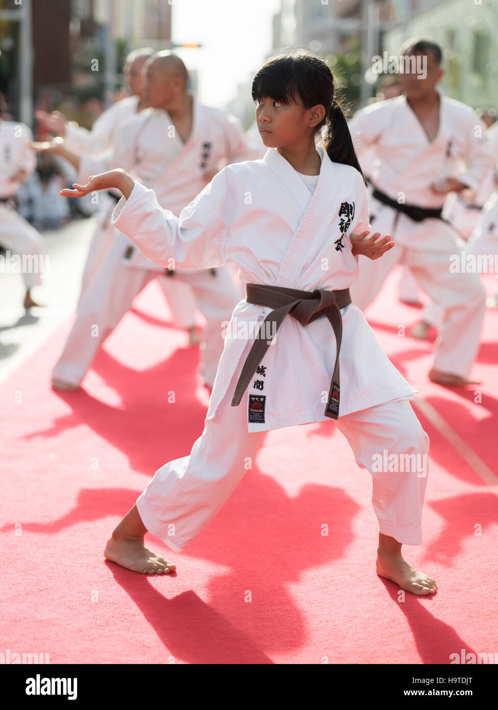 Guinness World Record for number of people performing a karate kata on Kokusai Street, Naha City, Okinawa, Japan. Stock Photo