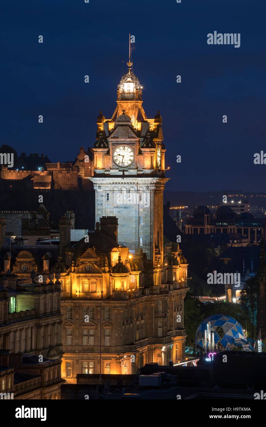 Balmoral Hotel tower illuminated in Edinburgh historic centre, Edinburgh, Scotland, United Kingdom Stock Photo