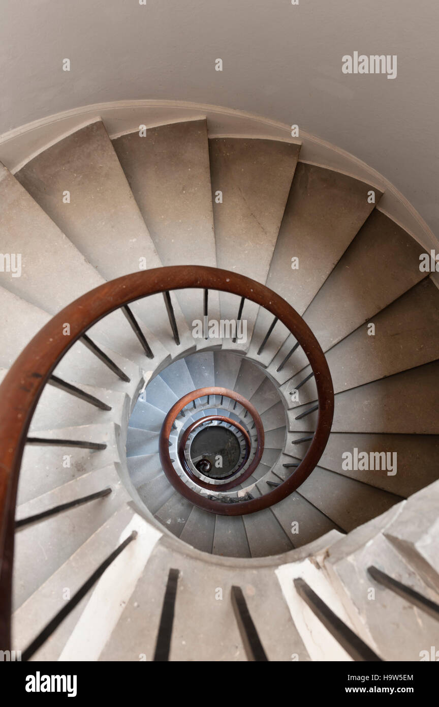 Spiral Staircase to the basement at Attingham Park, Shropshire. Stock Photo