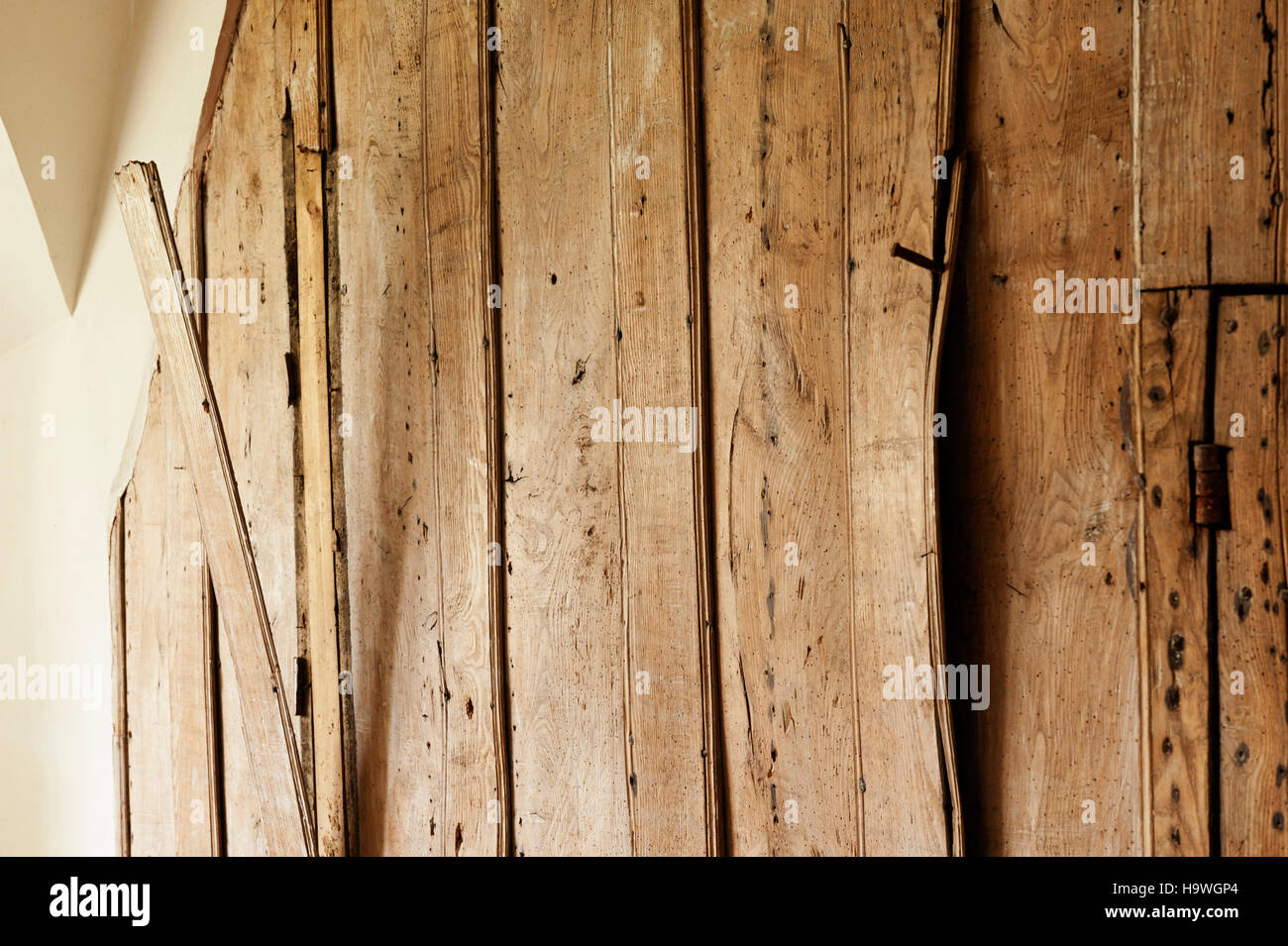 Warping wood panels at Avebury Manor, Wiltshire, Stock Photo