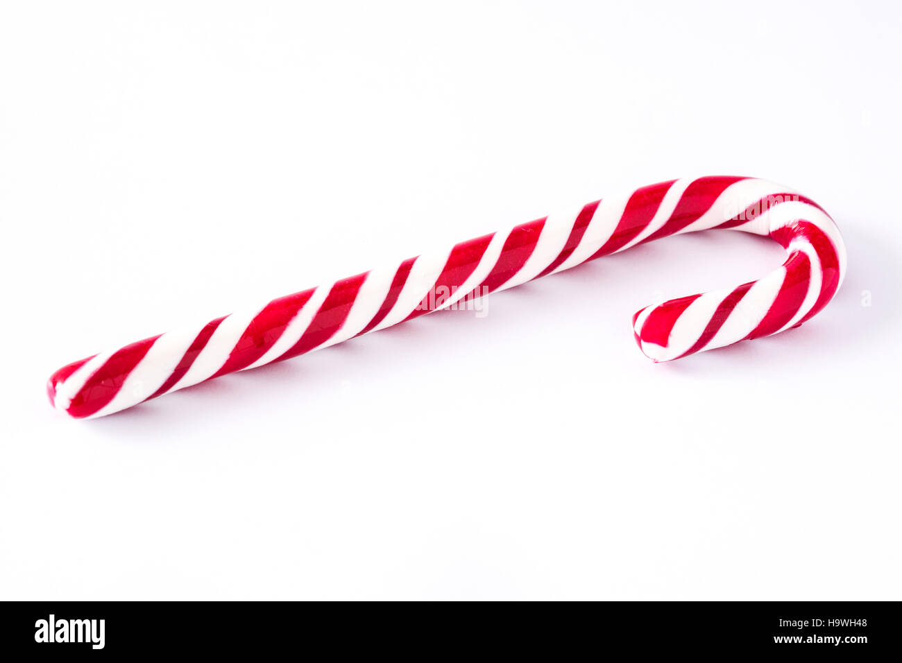 Candy cane isolated on white background Stock Photo - Alamy