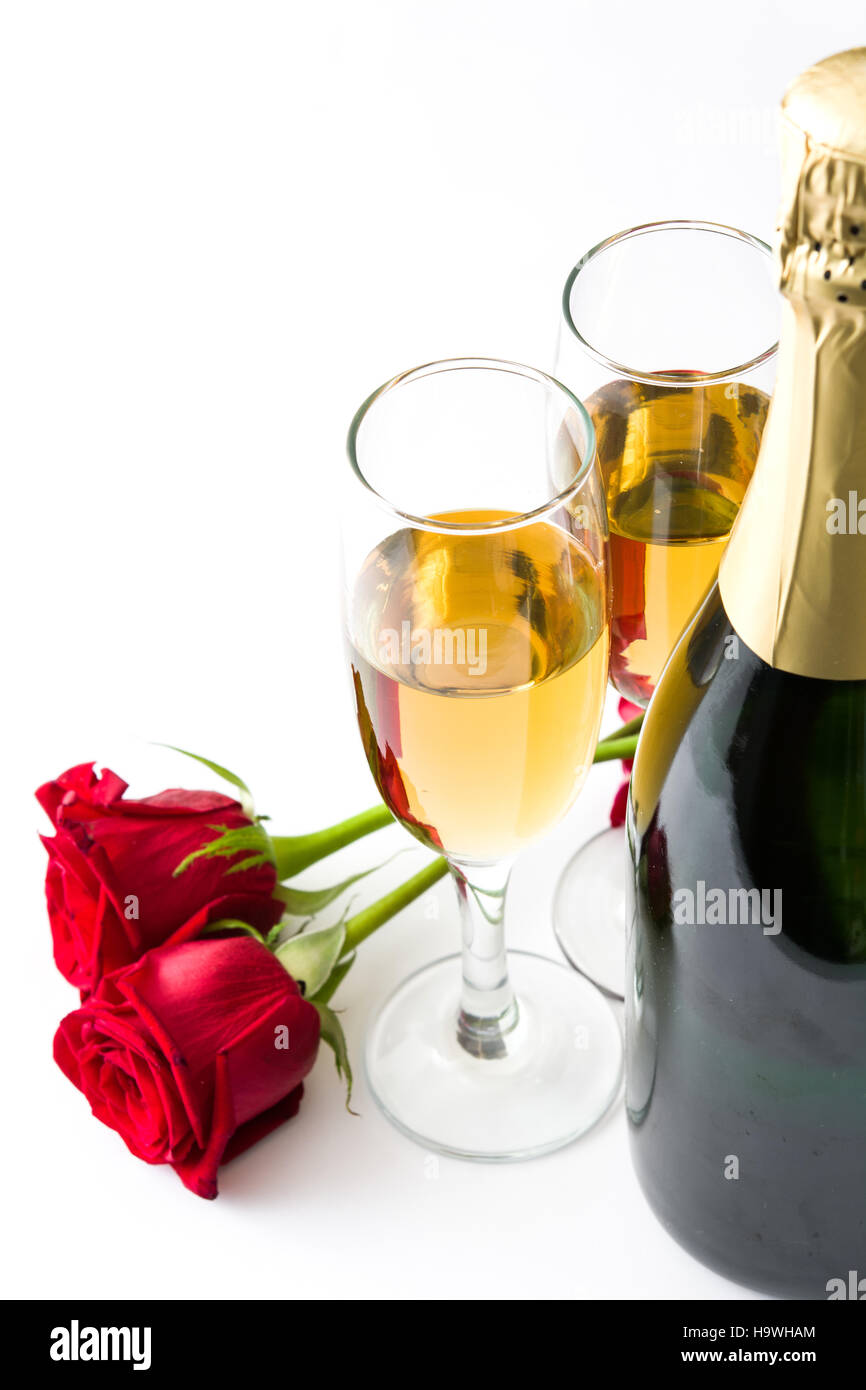 Champagne cups and rose isolated on white background Stock Photo Alamy