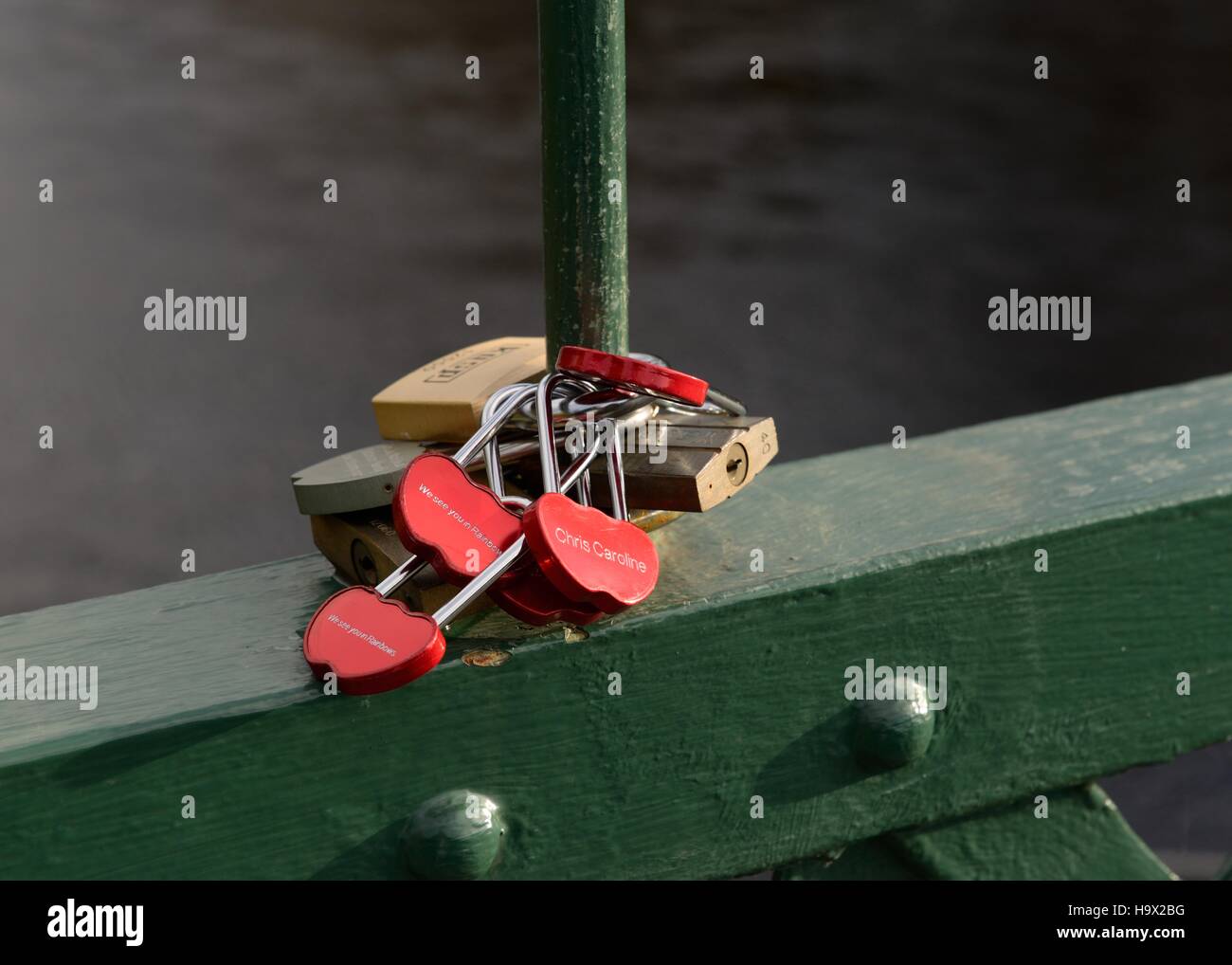 Love heart padlocks on a metal bridge Stock Photo