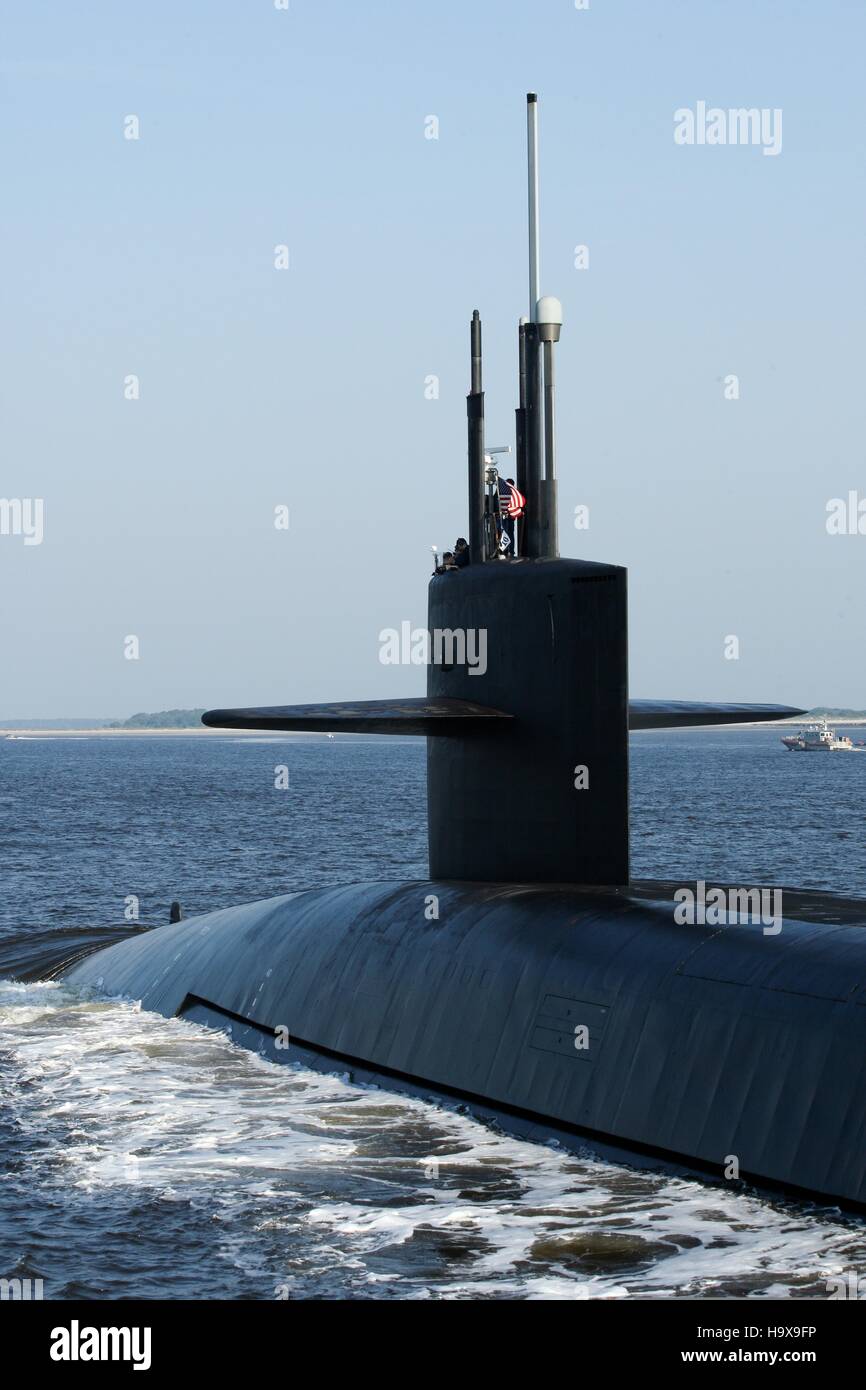 The USN Ohio-class ballistic missile submarine USS Alaska returns to the Naval Submarine Base Kings Bay May 22, 2014 near St. Marys, Georgia. Stock Photo