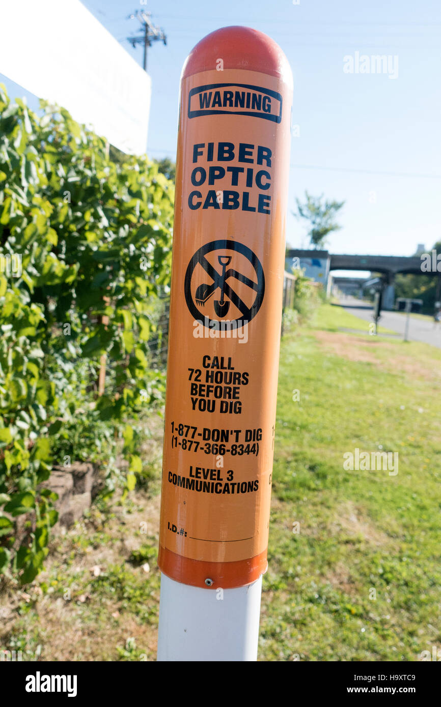 Sign warning not to dig as fiber optic cable has been laied along the Midtown Greenway Trail. Minneapolis Minnesota MN USA Stock Photo