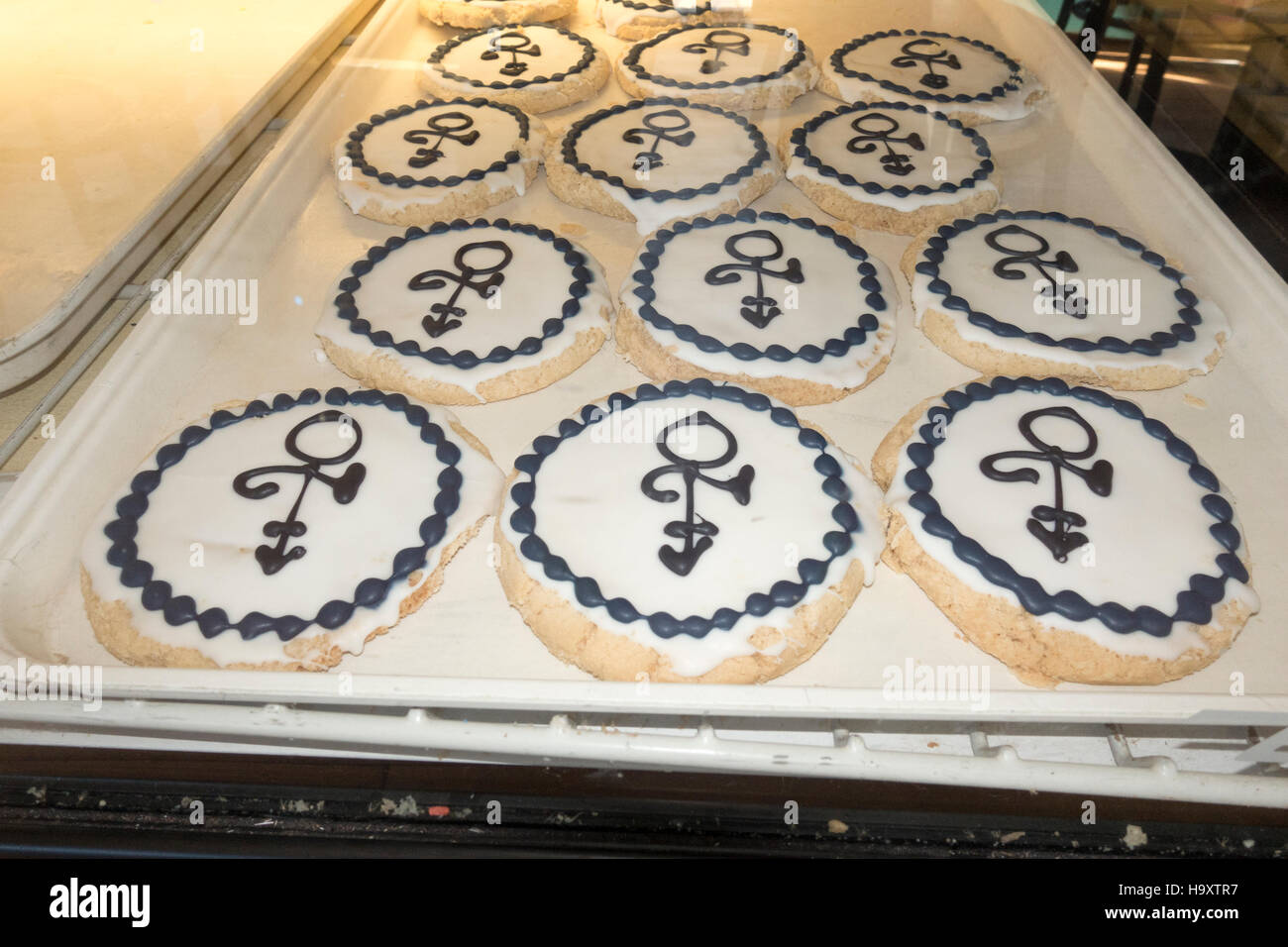 Sugar cookies found at the Mel-O-Glaze bakery with the Prince Love symbol applied to the frosting.  Minneapolis Minnesota MN USA Stock Photo
