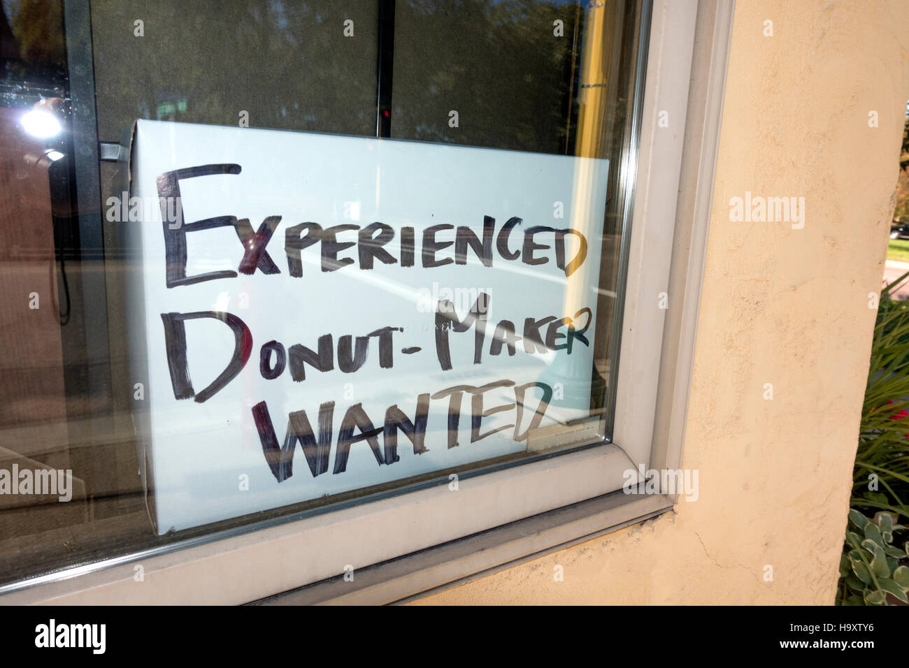 Experienced Dounut-Maker Wanted Sign in the iconic Mel-O-Glaze bakery window. Minneapolis Minnesota MN USA Stock Photo