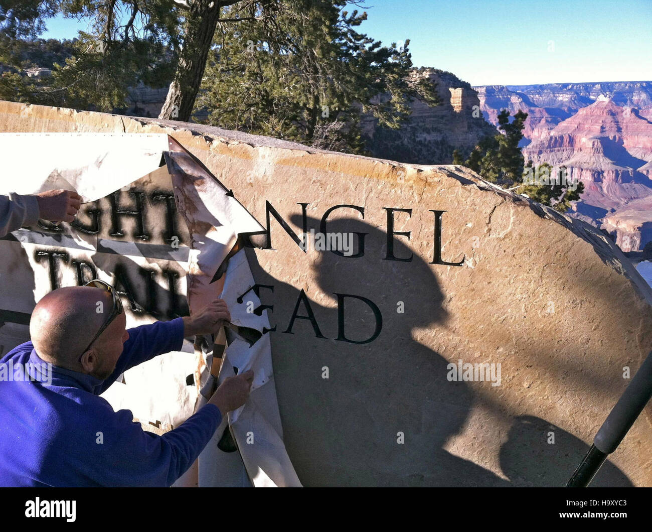 At the Grand Canyon National Park, workers perform sandblasting and ...