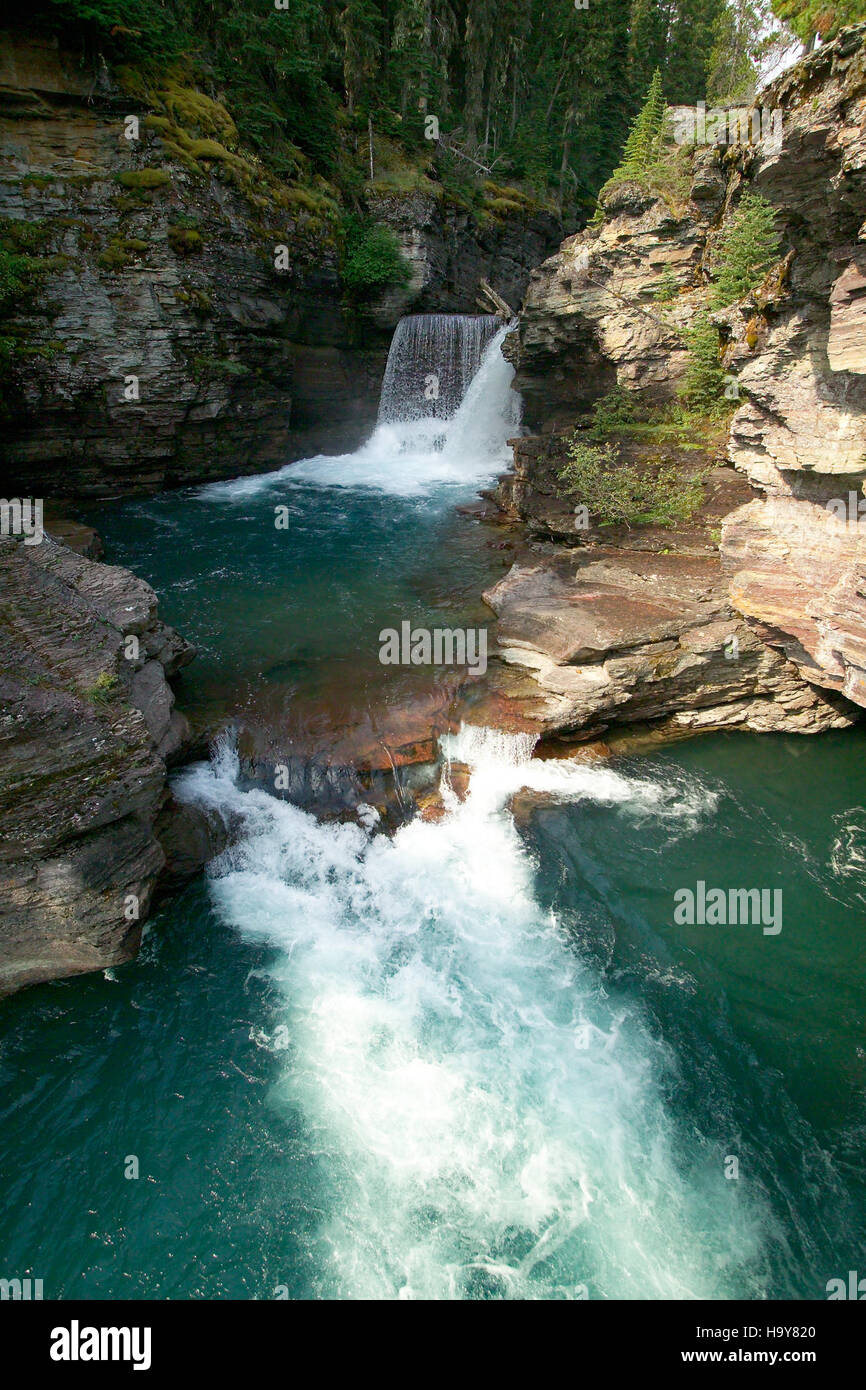 St. Mary Falls in Glacier National Park is a picturesque waterfall ...