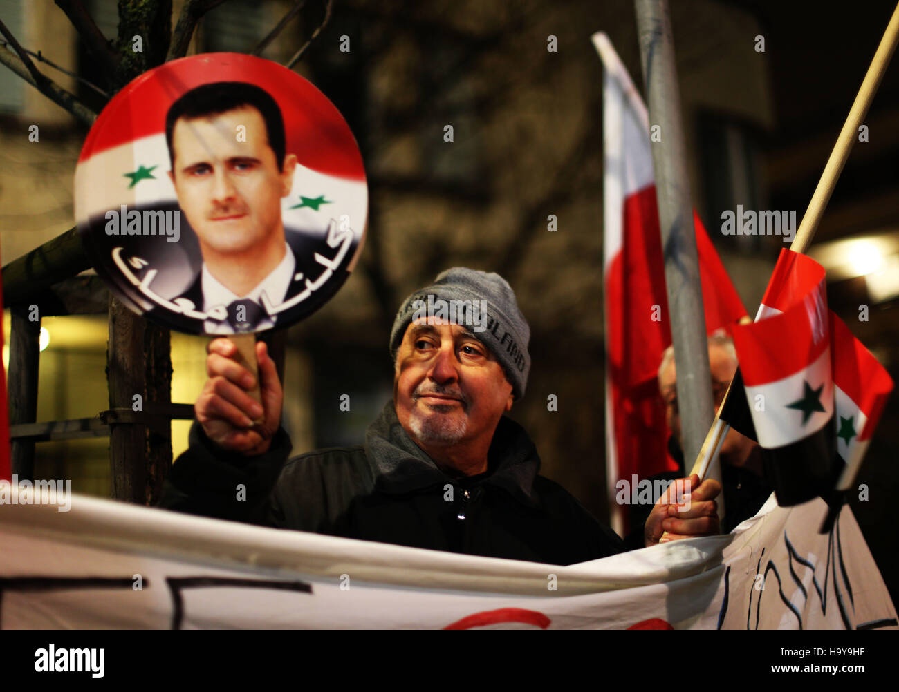 Warsaw, Poland. 25th Nov, 2016. A counter-protest was staged in front of the Russian Embassy n Warsaw, Poland. Protesters who favor Bashar Al-Assad, staged the counter-protest against those who were demonstrating against the Russian airstrikes on Aleppo as well as as what they see as, 'The Assad regime, supported strongly by the power driven Kremlin. Credit:  Anna Ferensowicz/ Pacific Press/Alamy Live News Stock Photo