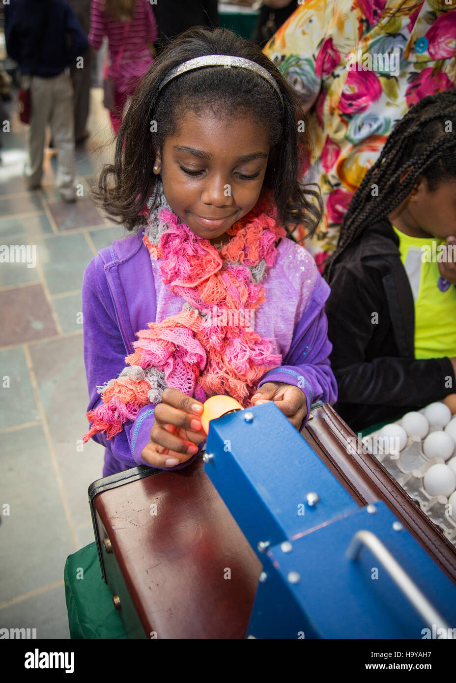 This photo from the USDA event 'Take Our Sons and Daughters to Work' shows participants at the Jamie Whitten Building in Washington, D.C., highlighting the importance of family involvement in work environments. Stock Photo