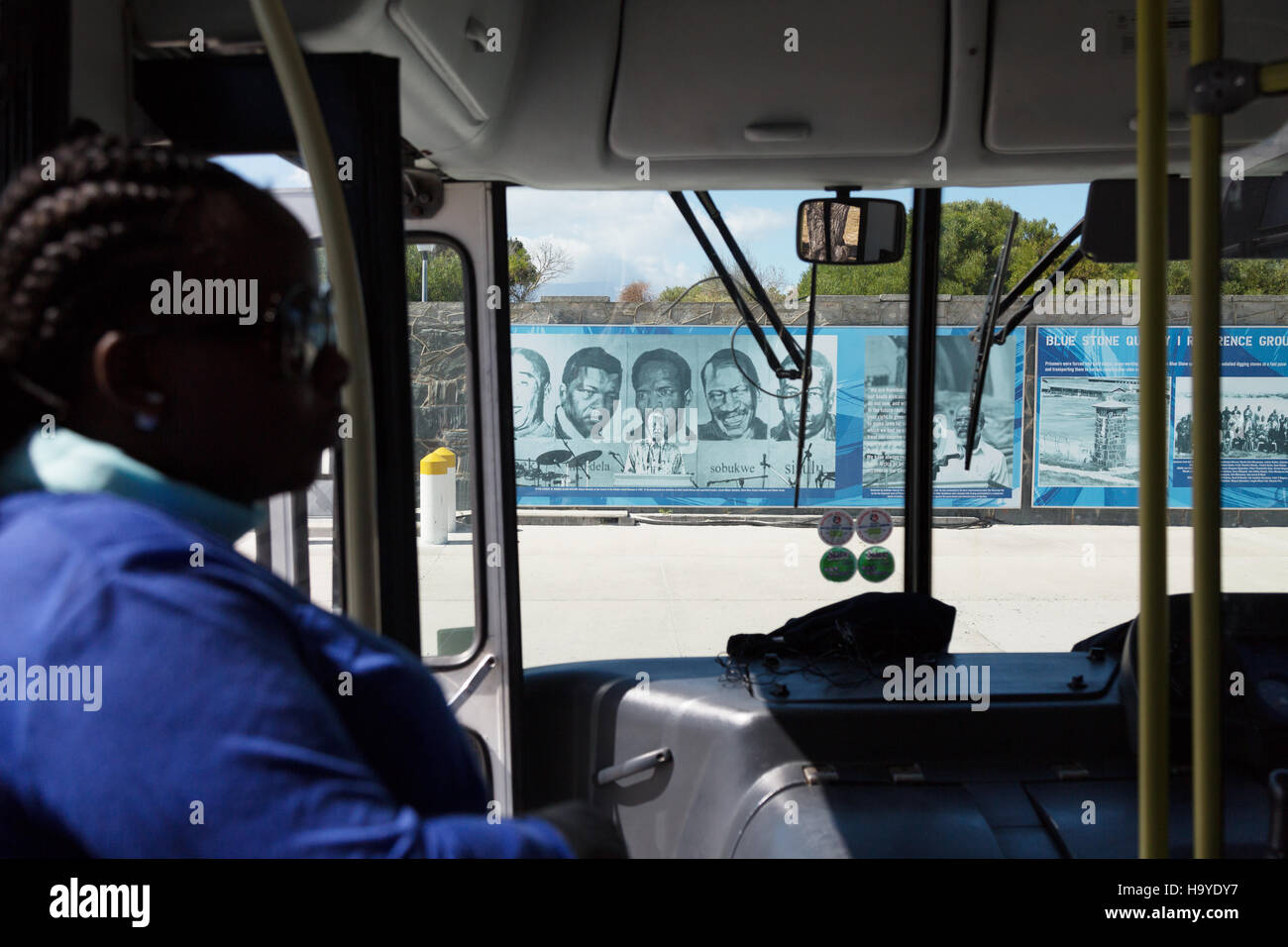 A woman visitor on the bus during the Robben Island Museum tour, Robben Island, Cape Town, South Africa Stock Photo