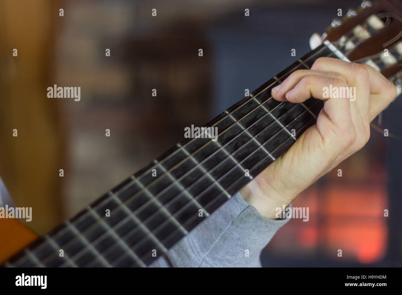 Close Up of Man Playing Guitar Stock Photo