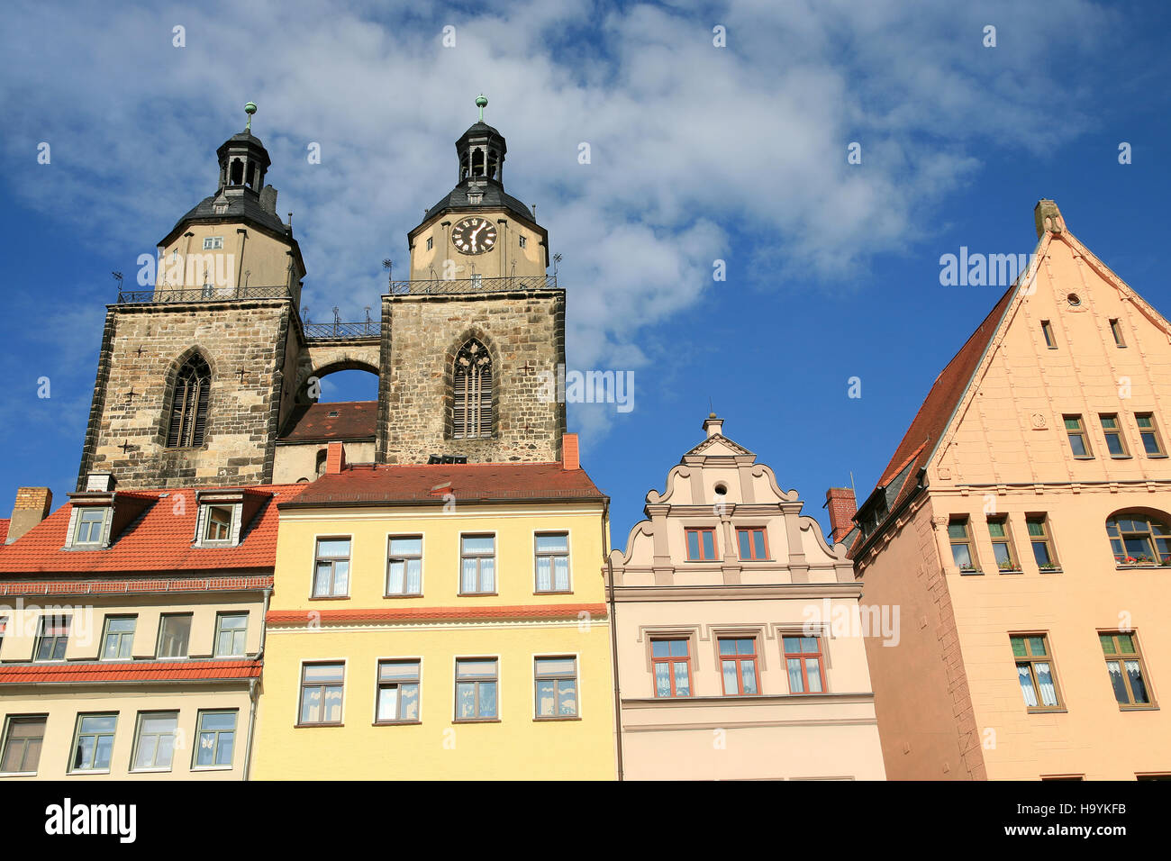 St.Mary's church and houses around the market square in Lutherstadt Wittenberg Germany Stock Photo