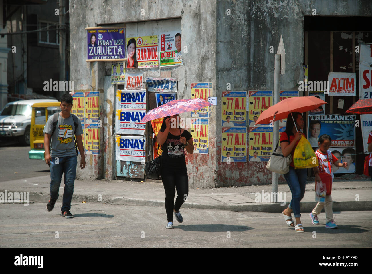 People with umbrellas, Iloilo City, Western Visayas, Philippines Stock ...