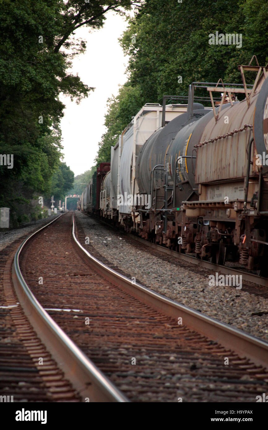 Railroad tracks with freight train in NoDa, Charlotte, NC Stock Photo