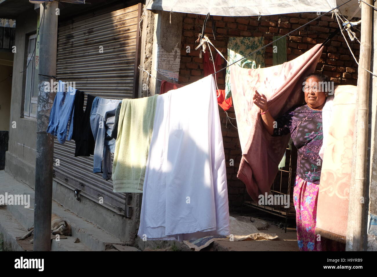 woman hangs her laundry in Kathmandu,Nepal Stock Photo Alamy