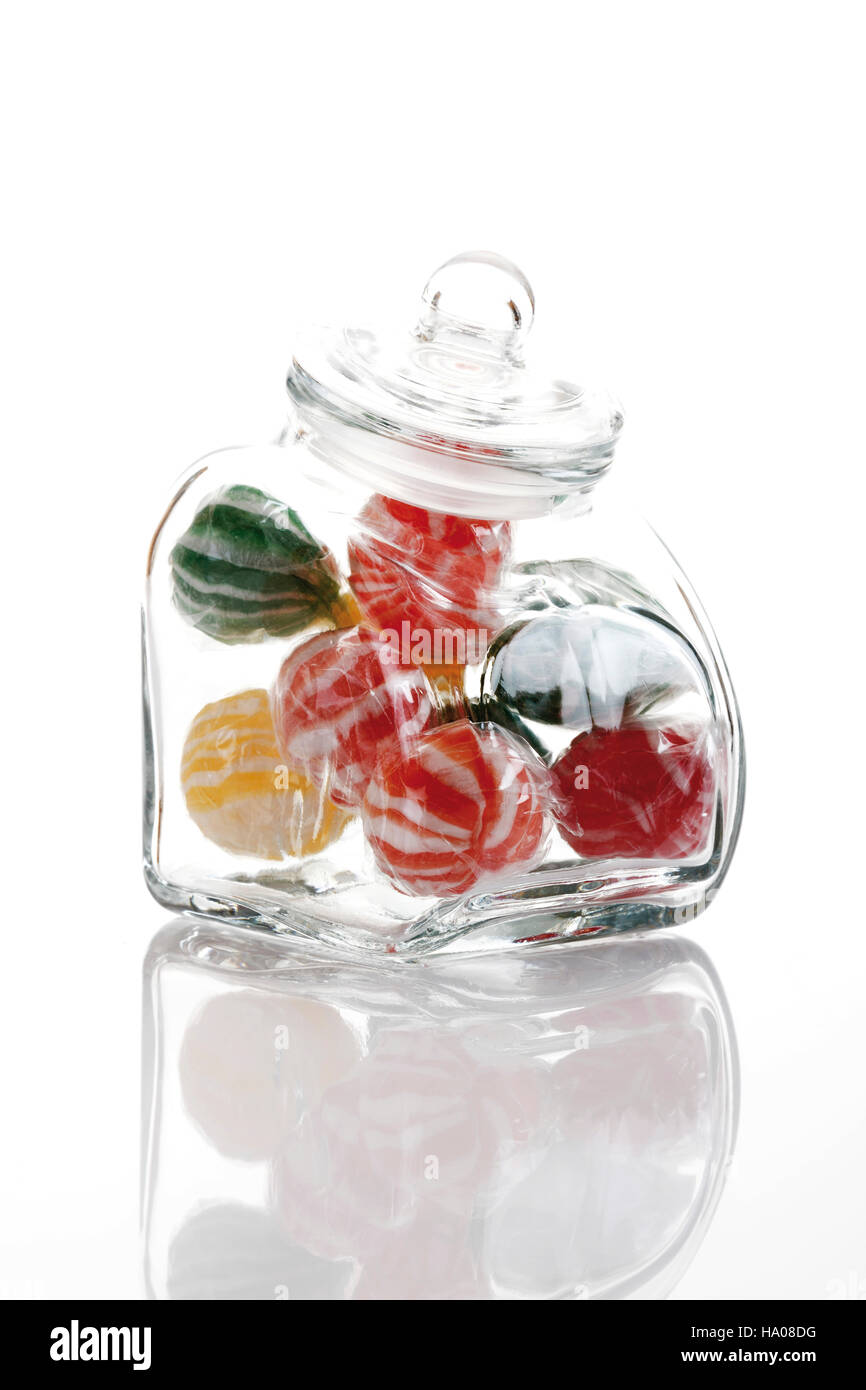 Striped sweets in a glass jar Stock Photo Alamy