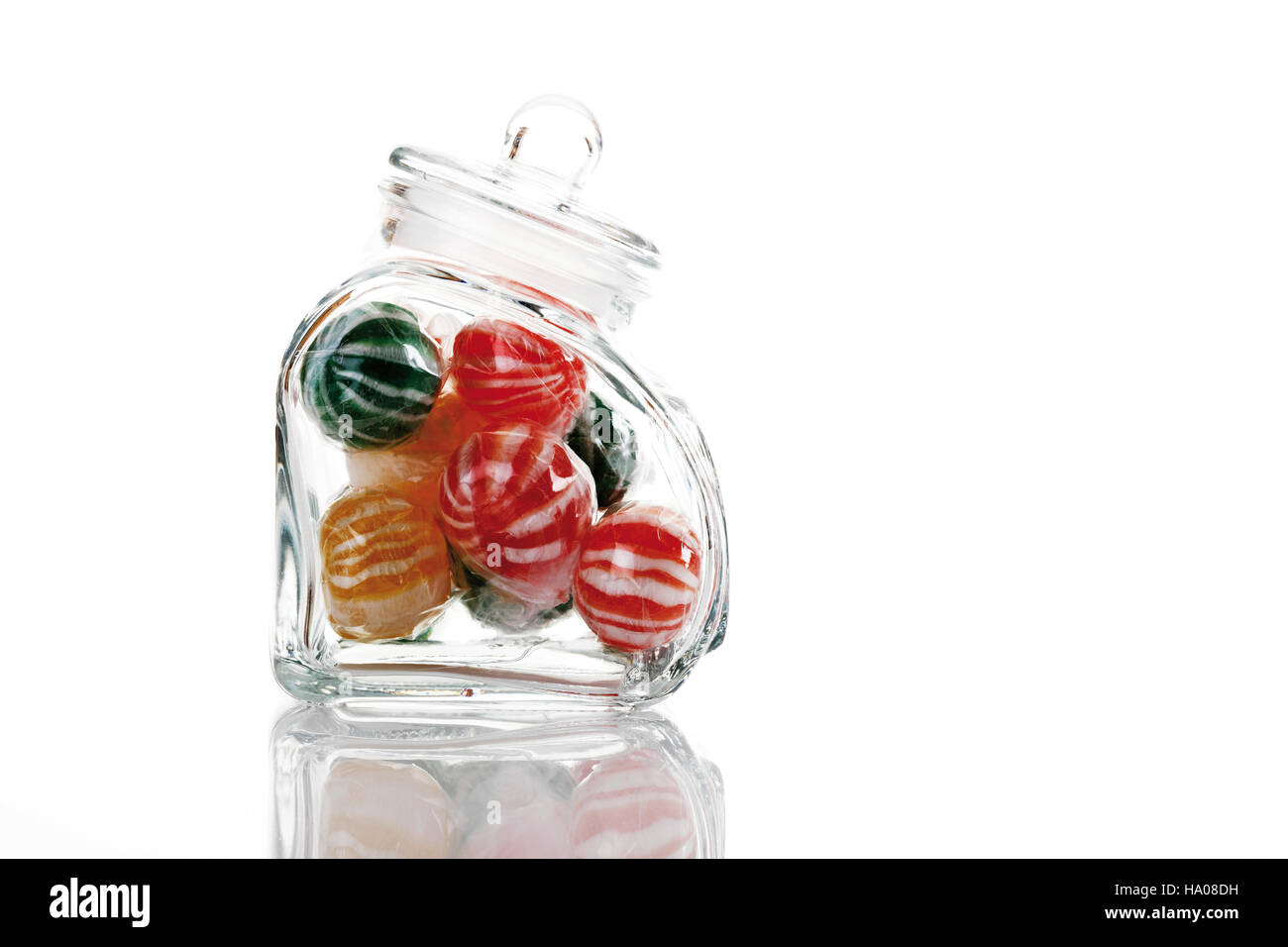 Striped sweets in a glass jar Stock Photo Alamy