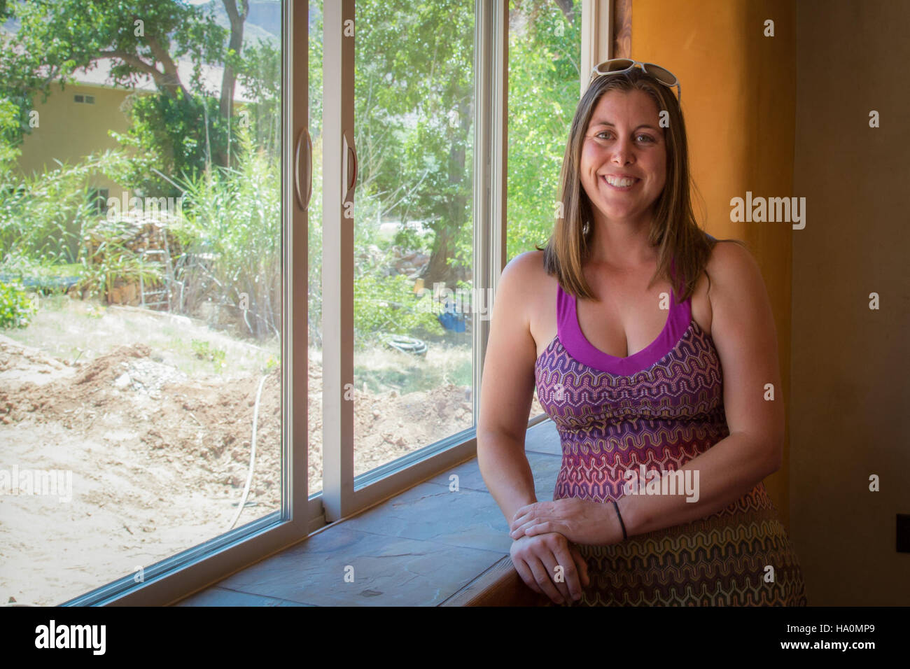 usdagov 19508365678 Heather Gallagher inside her new home Stock Photo