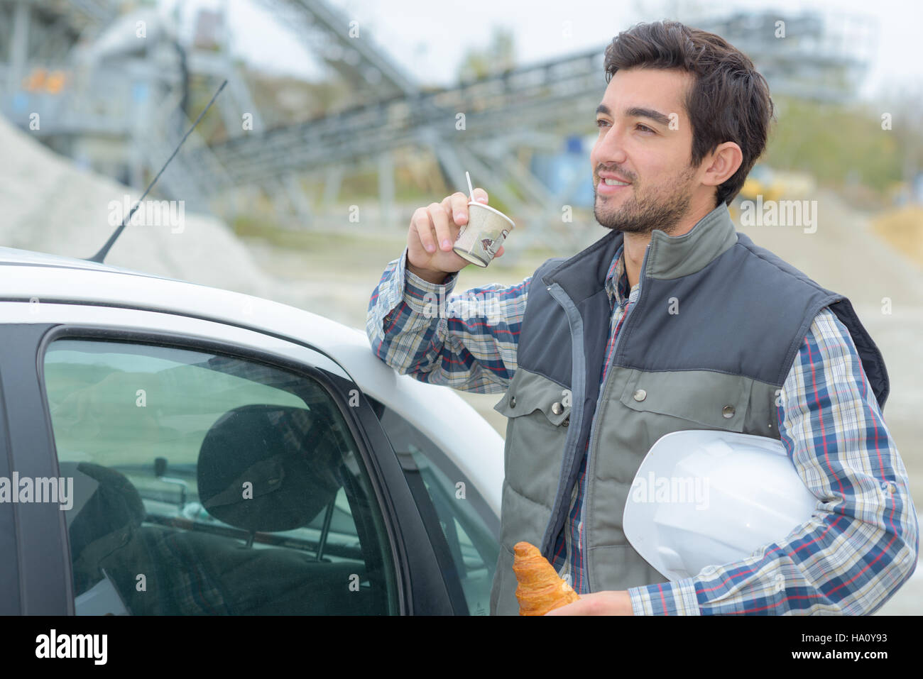 Construction drinking coffee construction site hi-res stock photography ...