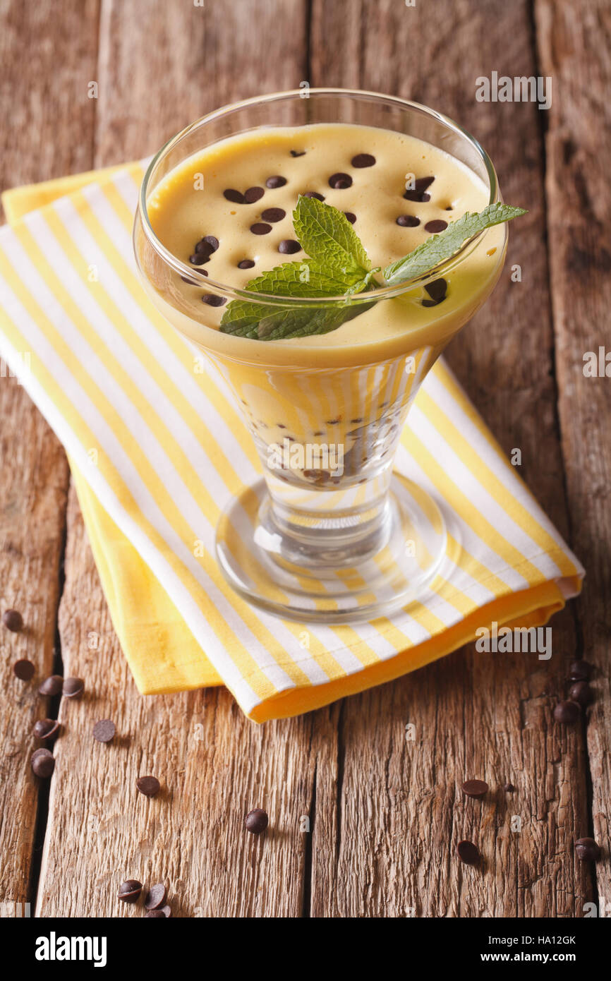 Italian Zabaione dessert with chocolate close up in a glass on the ...