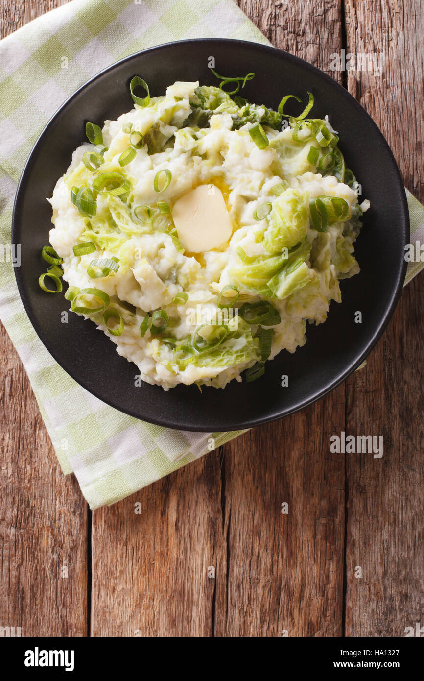 Irish colcannon mashed potatoes with savoy cabbage and butter closeup