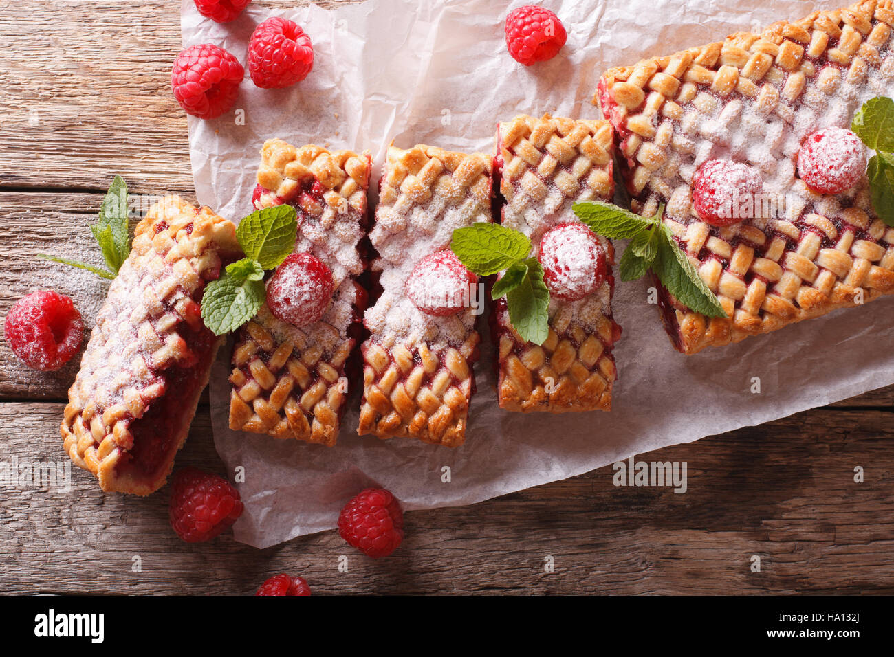 Homemade tasty raspberry pie close-up on the table. horizontal view from above Stock Photo