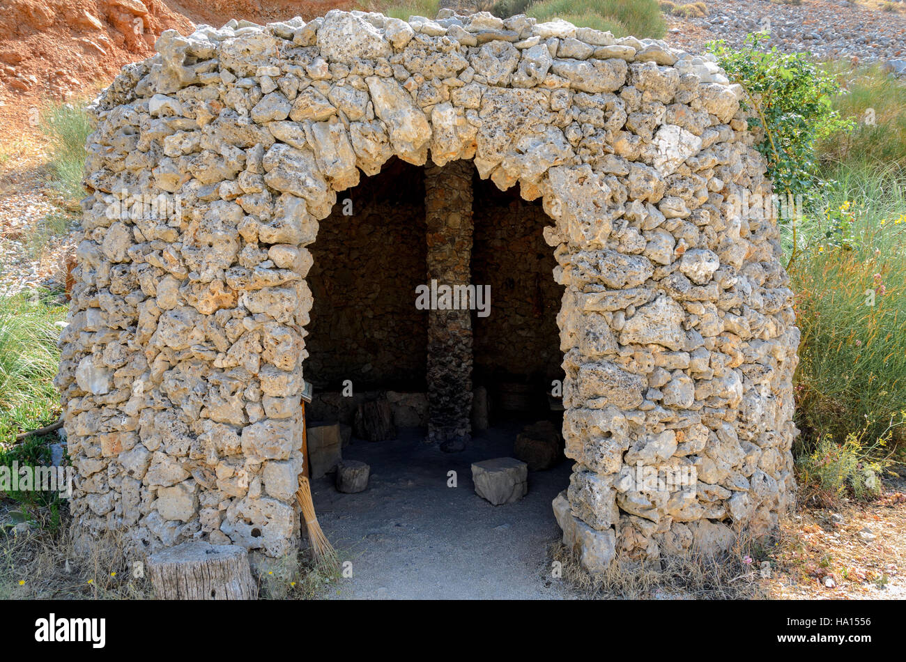 Stone-age homo sapiens old house on Crete island Stock Photo