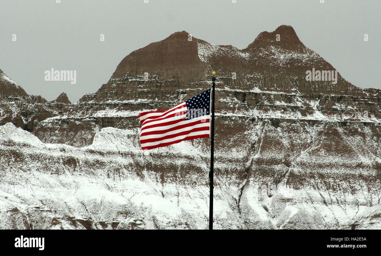 Badlands and Flag in Winter Stock Photo