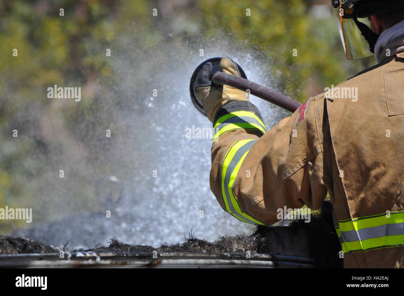 Park rangers & Boulder City firefighters extinguish boat fire Stock Photo