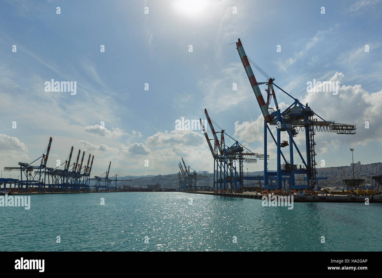 Cranes against the sky in the seaport Stock Photo