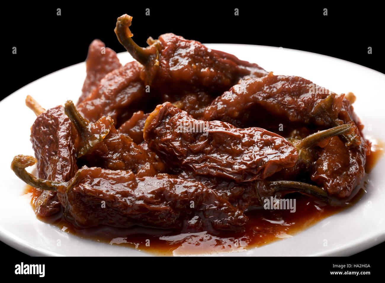 Chipotles en Adobo, a whole smokedried overripe Jalapeno peppers in
