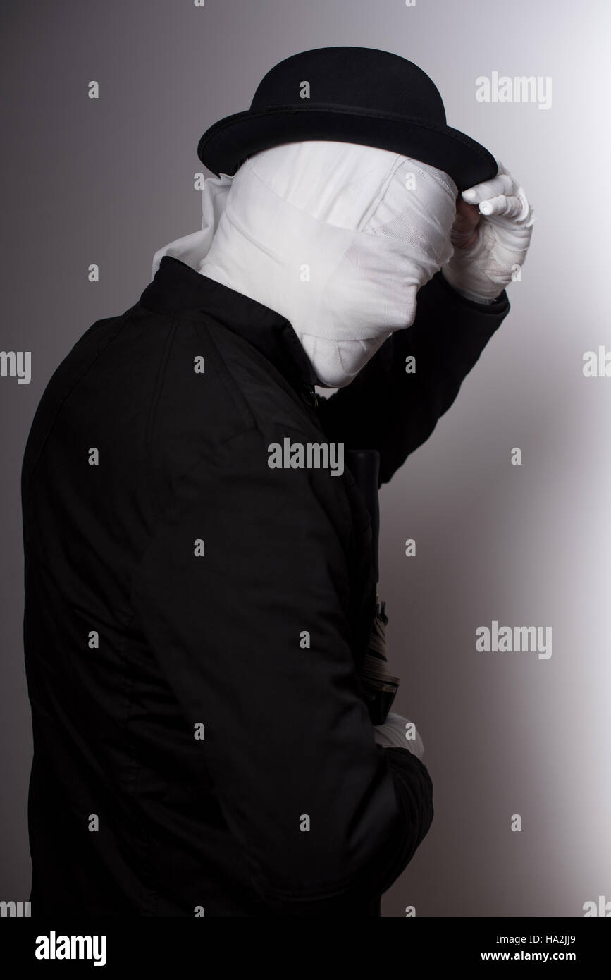 Faceless Halloween Man with a bandaged face Stock Photo